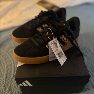 Adidas Black and Tan Sneakers with Patterned Accents